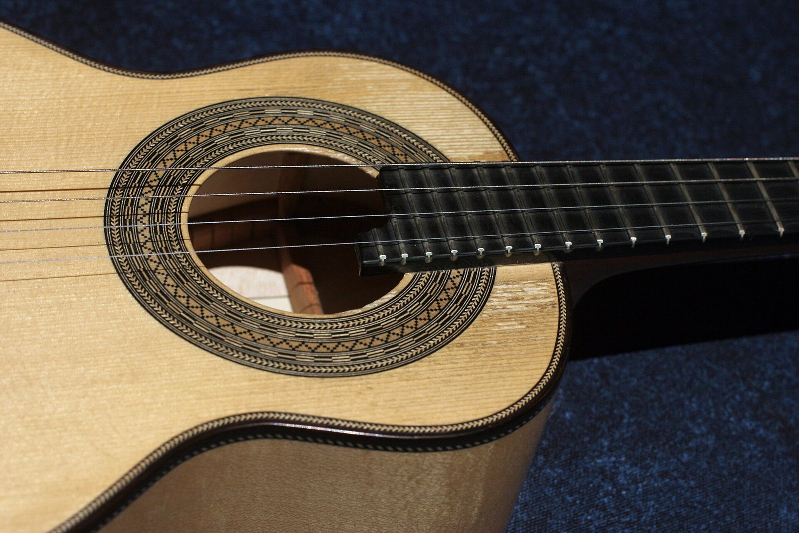 Close-up of a cavaquinho, a small handcrafted string instrument